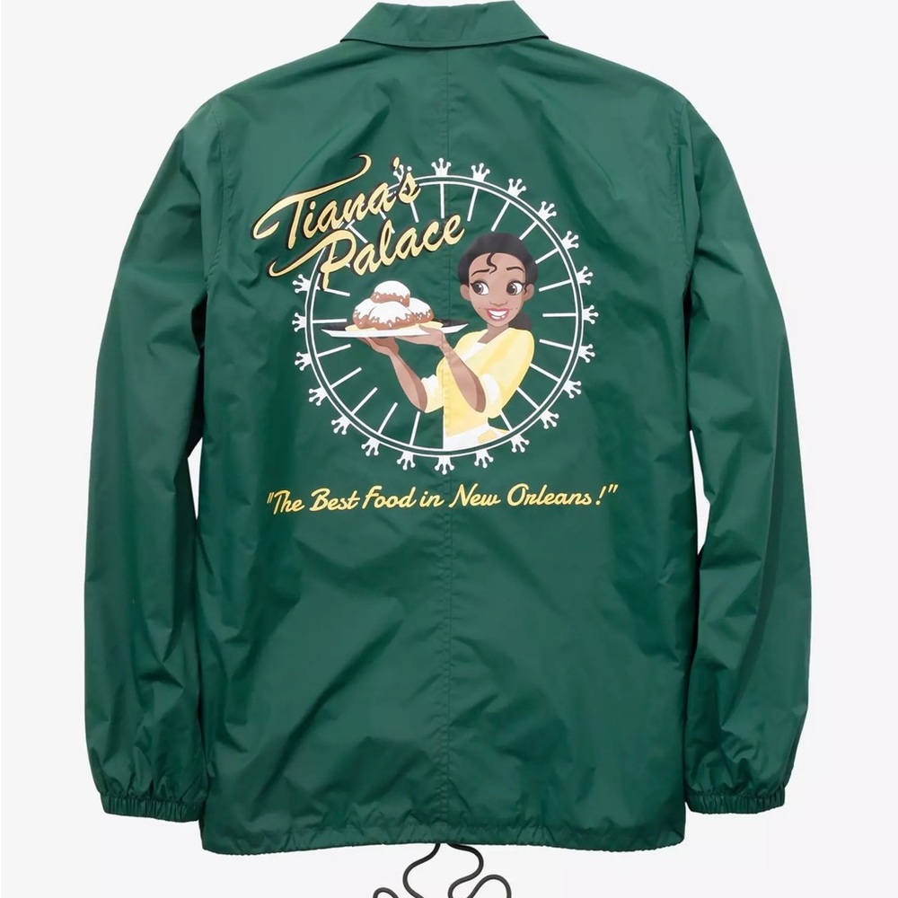 Tiana's Palace Green Windbreaker Jacket, serving a plate of beignets